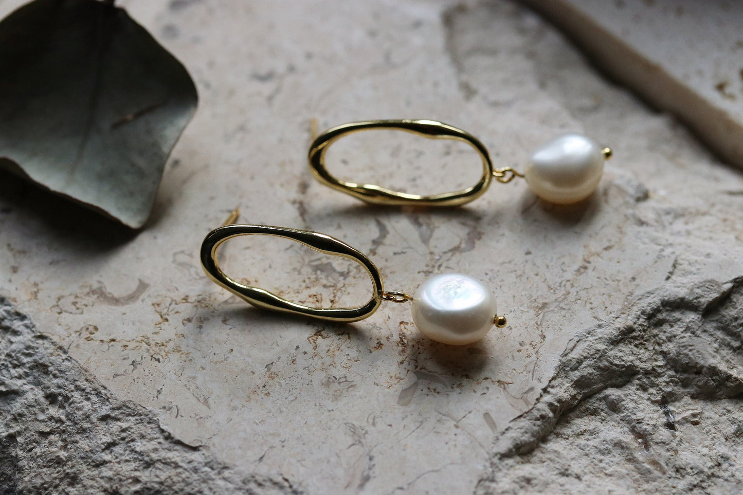 Shan&Co's Sterling Silver/Gold Vermeil Irregular Pearl Hoop Drop Earrings, featuring unique baroque pearls for a one-of-a-kind look, crafted with genuine freshwater pearls and available in sterling silver or gold vermeil.