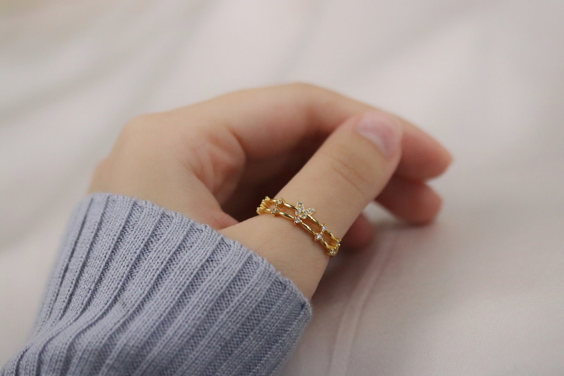 Gold Vermeil Butterfly Cluster Crystal Ring with delicate butterfly and diamond-like crystal accents, elegant and nature-inspired design.