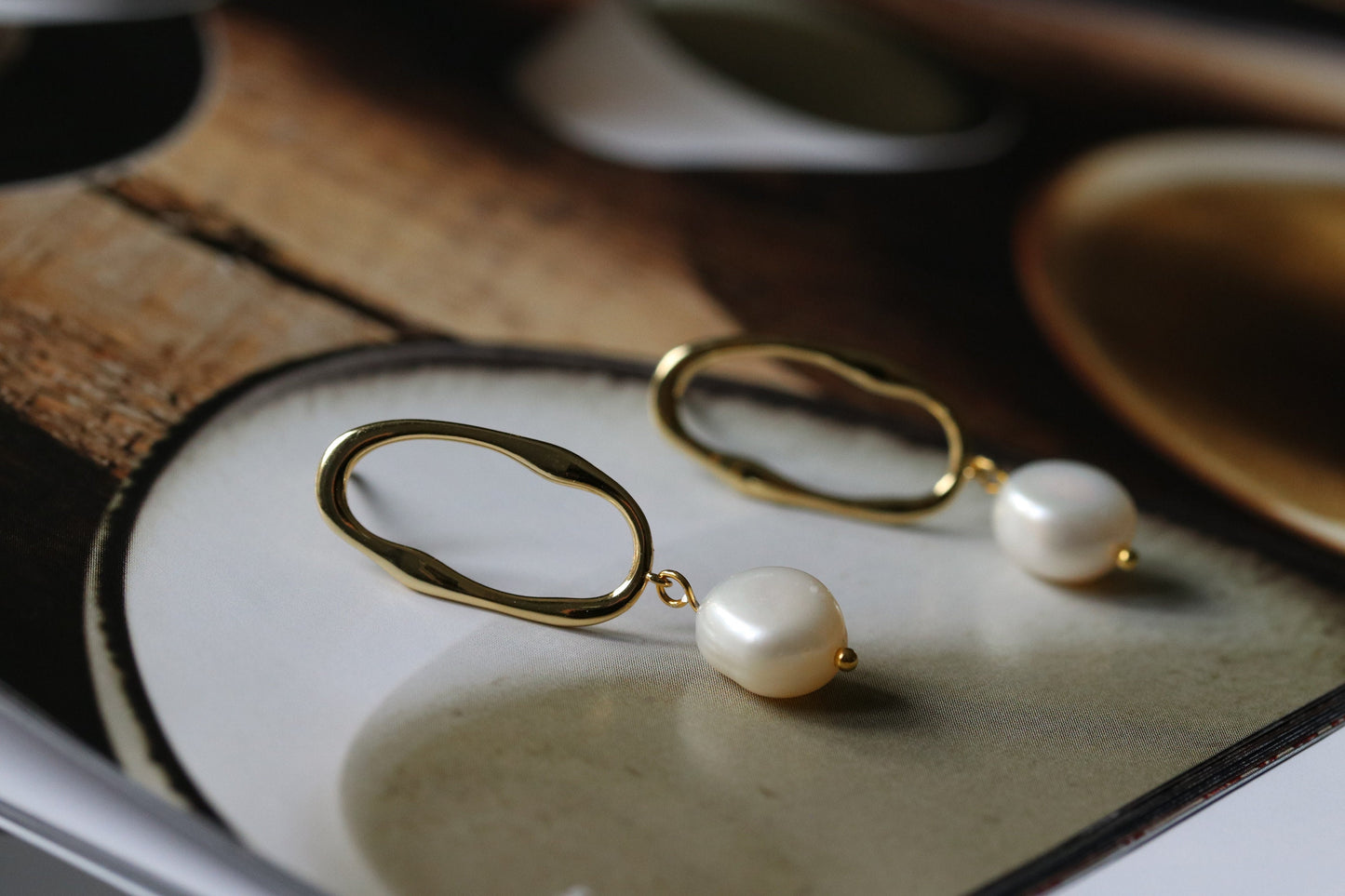 Shan&Co's Sterling Silver/Gold Vermeil Irregular Pearl Hoop Drop Earrings, featuring unique baroque pearls for a one-of-a-kind look, crafted with genuine freshwater pearls and available in sterling silver or gold vermeil.