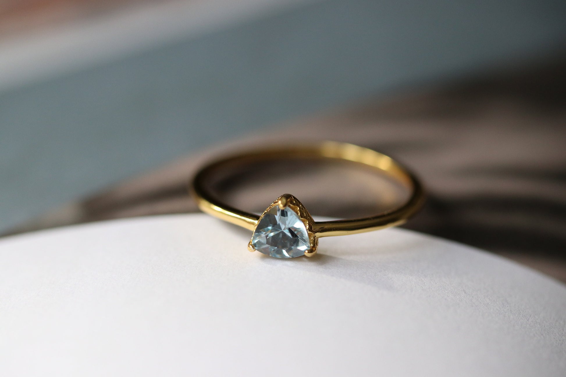 Gold Vermeil Vintage Blue Topaz Ring with natural CZ accents, delicate gemstone ring with trilliant-cut crystal.

