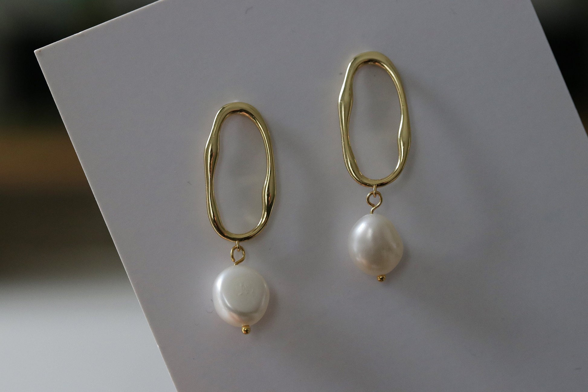 Shan&Co's Sterling Silver/Gold Vermeil Irregular Pearl Hoop Drop Earrings, featuring unique baroque pearls for a one-of-a-kind look, crafted with genuine freshwater pearls and available in sterling silver or gold vermeil.