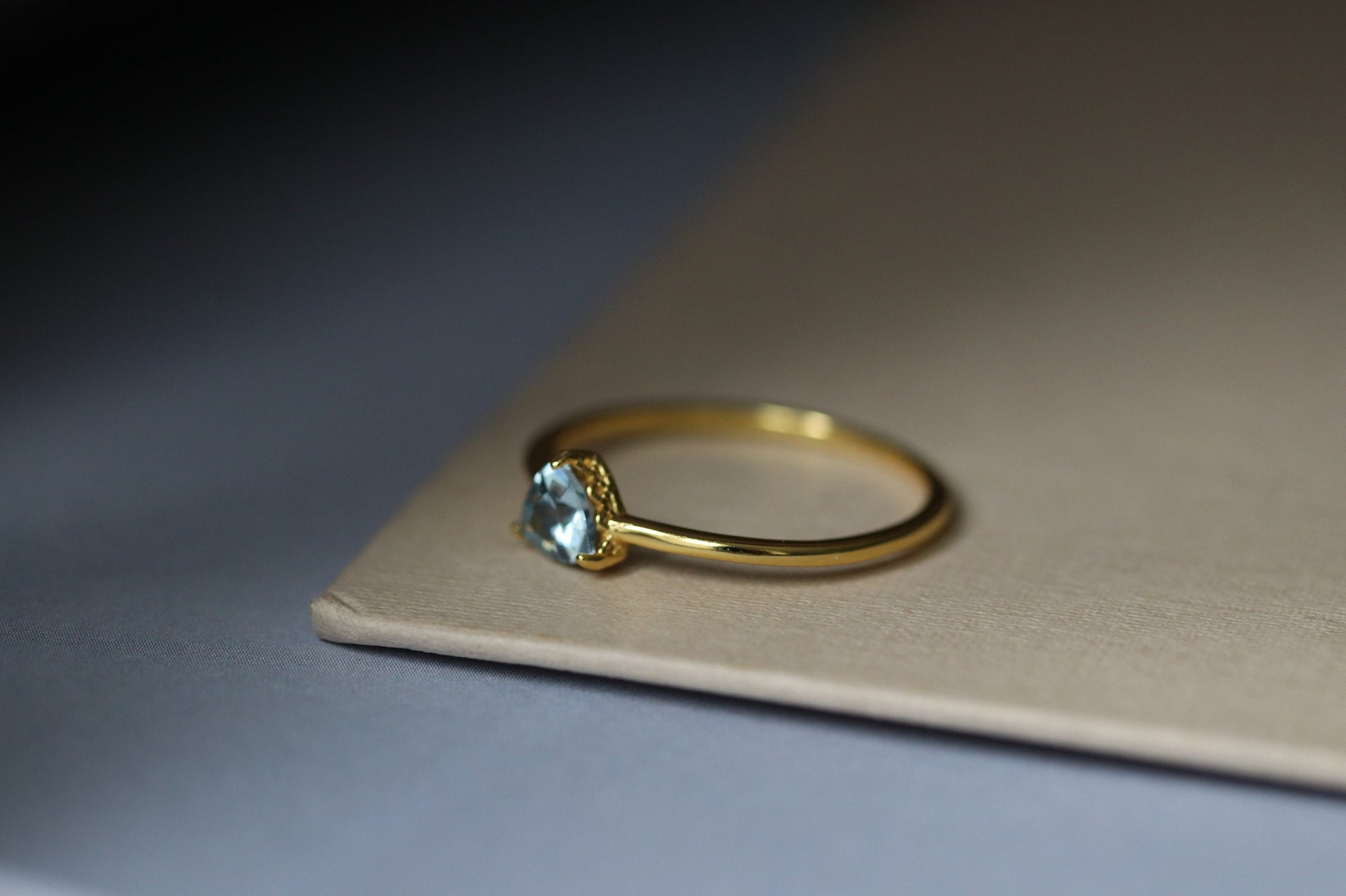 Gold Vermeil Vintage Blue Topaz Ring with natural CZ accents, delicate gemstone ring with trilliant-cut crystal.

