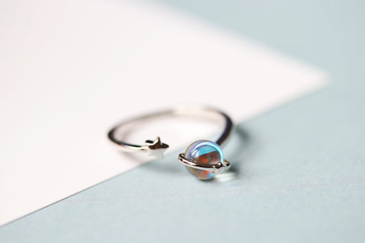 Sterling Silver Opal Star Moon Ring with vintage crescent moon design, featuring an adjustable open band and delicate opal accents, perfect for celestial-inspired style.