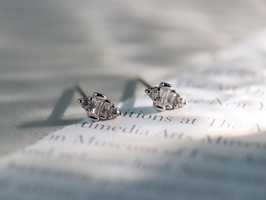 Close-up image of Sterling Silver/Gold Vermeil Crystal Baguette Stud Earrings, featuring minimalist rectangular geometric design with sparkling crystal baguette stones.