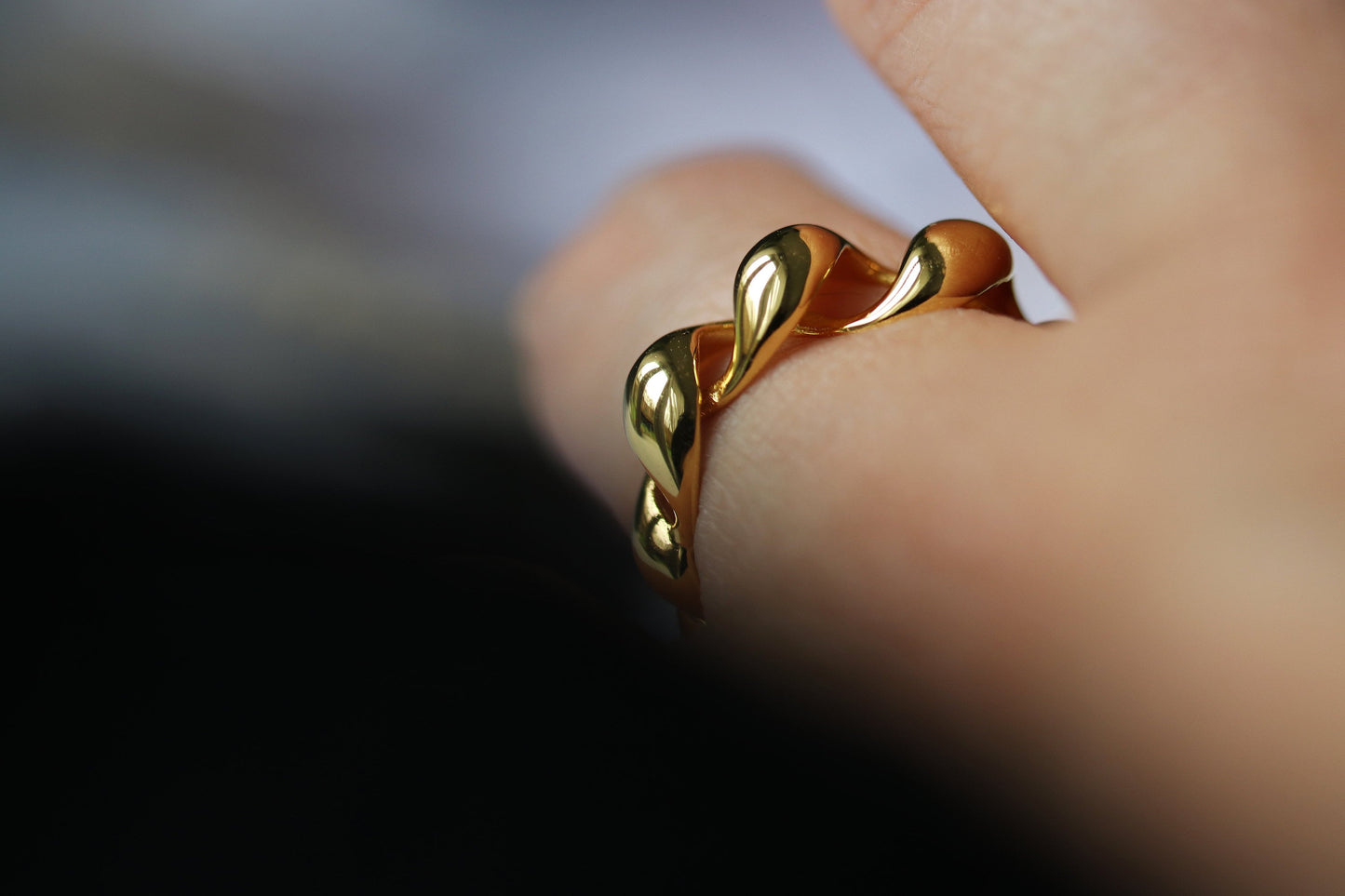 Gold vermeil chunky dome ring with a twisted croissant-inspired design, perfect as a bold statement piece.