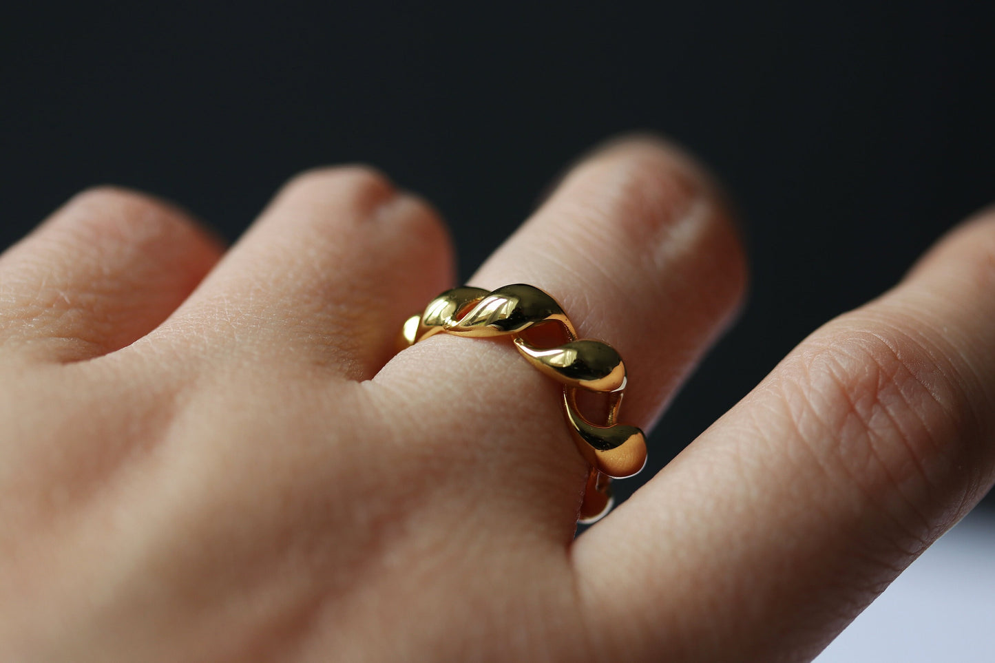 Gold vermeil chunky dome ring with a twisted croissant-inspired design, perfect as a bold statement piece.